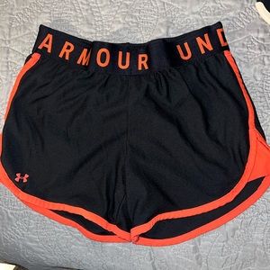 Under armour black and coral shorts size medium with pockets